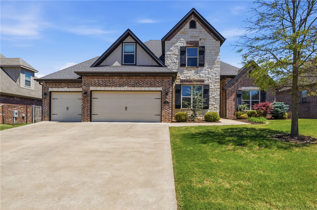 Welcome home to this beautifully maintained 5-bedroom, 3-bath residence in the heart of Bentonville! From the moment you step inside, you'll appreciate the soaring ceilings, elegant crown molding, and abundant natural light that create a bright, inviting atmosphere. The spacious floor plan offers generously sized bedrooms, providing comfort and flexibility for family, guests, or a home office. The oversized 3-car garage offers plenty of room for vehicles, storage, and hobbies.

Located in a desirable neighborhood with a community pool and convenient access to top-rated schools, this home combines everyday comfort with an exceptional location. Thoughtfully cared for and move-in ready, it's the perfect place to enjoy all that Bentonville has to offer.