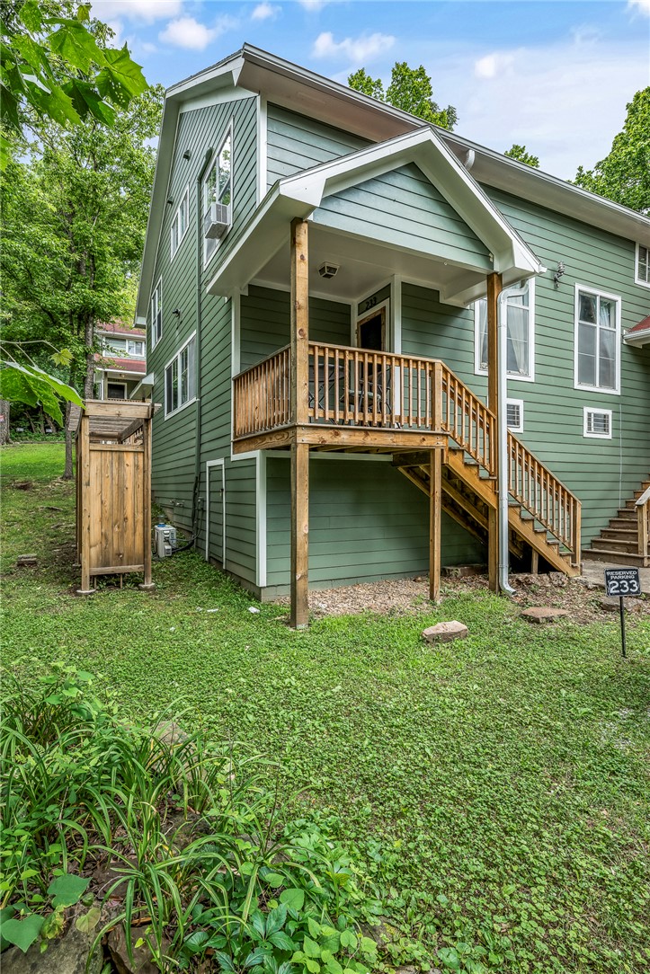 Experience the best of downtown Fayetteville living in this charming corner condo overlooking the beautiful Ramble Park. This thoughtfully designed 1-bedroom, 1-bath home features an open floor plan that maximizes space and natural light. Ideally located less than a half mile from the Fayetteville Public Library, the University of Arkansas, and the Fayetteville Square, you'll enjoy unparalleled access to the city's most popular destinations. Additional conveniences include one designated parking space, making this an exceptional opportunity for homeowners, students, professionals, or investors seeking a prime location in the heart of Fayetteville.