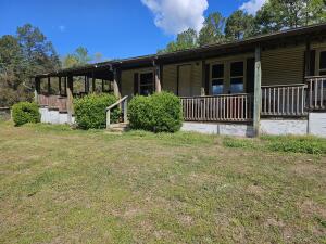 Sit back on the oversize deck and watch the sunset with a beautiful mtn views. Enjoy the quiet setting of this fixer upper. 3BD 2 Full Bath.  The price is set to move fast, so don't miss out on this one.  Sold as is, where is, no repair.