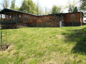 Beautiful 5 Bedroom 3 bath double-wide modular home with a large new addition (great room) and finished poured basement - 2859 sq ft home is beautifully decorated, with rock wood burning fireplace, formal dining room, gorgeous kitchen, large family room. Home has large decks,m located in beautiful setting. Land is level, with mixture of pasture & woods, 2 large ponds, barn & outbuilding.