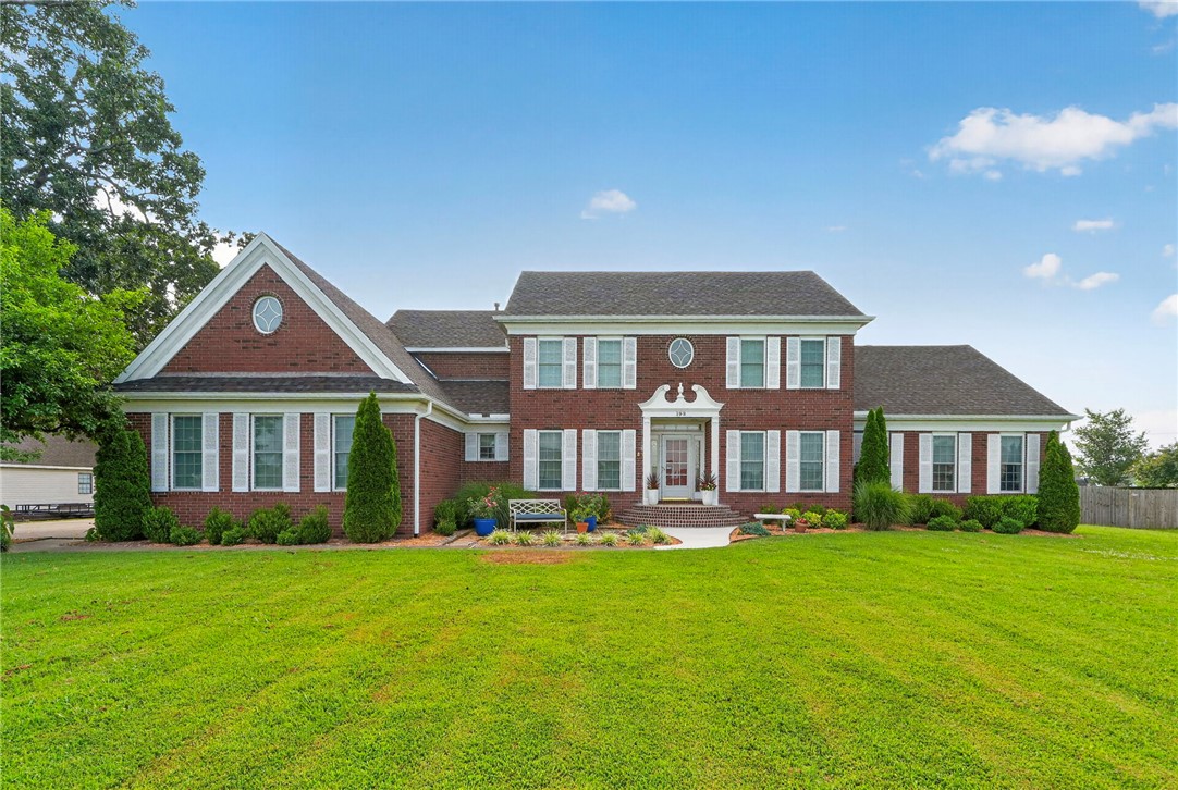 Some homes simply offer more—and this is one of them. Set on nearly an acre in the heart of Northwest Arkansas, this thoughtfully designed home offers 3,504 sq ft of living space per county records, plus an expansive heated & cooled 2,409 sq ft unfinished basement ready to become whatever you can dream up. Meticulously maintained and offering quality finishes and updates throughout, including solid hardwood floors, quartz countertops, upgraded appliances, & a brand-new roof with Class 4 architectural shingles.The main level includes a chef's kitchen, dining room, two additional living/office spaces, a large living room with cathedral ceilings, a half bath, laundry room, & a spacious primary suite with a beautifully updated bath, walk-in closet, and flex room.Upstairs, you'll find three ensuite bedrooms, each with its own private full bathroom. Parking is easy with an oversized three-car garage plus a detached two-car garage/workshop. This type of home is hard to find, schedule your private tour!