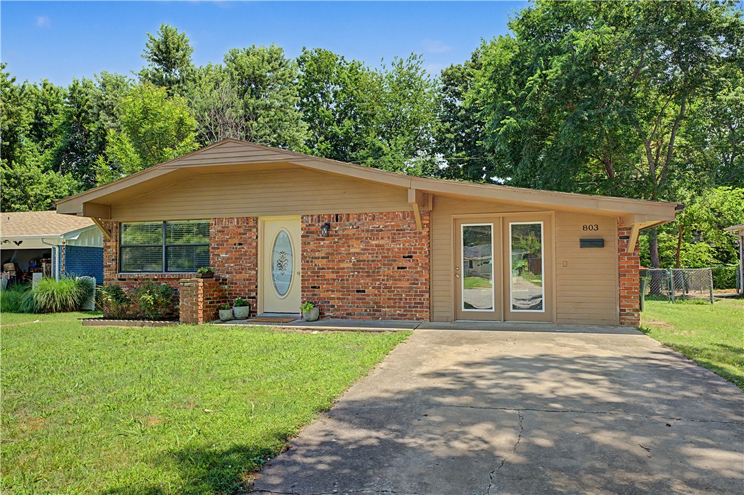 Welcome home to this beautifully updated house that combines comfort, style and convenience.  This move-in ready home has a new kitchen complete with new range, vent hood, granite countertops, kitchen cabinets, sink and faucet.  You'll also find new vanities in both bathrooms and updated lighting throughout the home.  The spacious family room is cozy with wood beams on the ceiling that extend through the kitchen. An extra flex space that contains the laundry area and a door leading to the fenced back yard.  With many improvements already completed, this home is ready for its new owner!