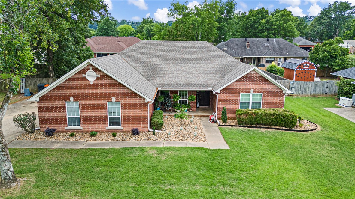 Spacious and updated home in a desirable dead-end street setting! This 4BR/2BA property offers approximately 2,237 sq ft with an open floor plan, updated kitchen and bathrooms, tile flooring throughout, surround sound, and oversized kitchen bar perfect for entertaining. Outside features include a fenced backyard, manicured lawn, and attached two-car garage.