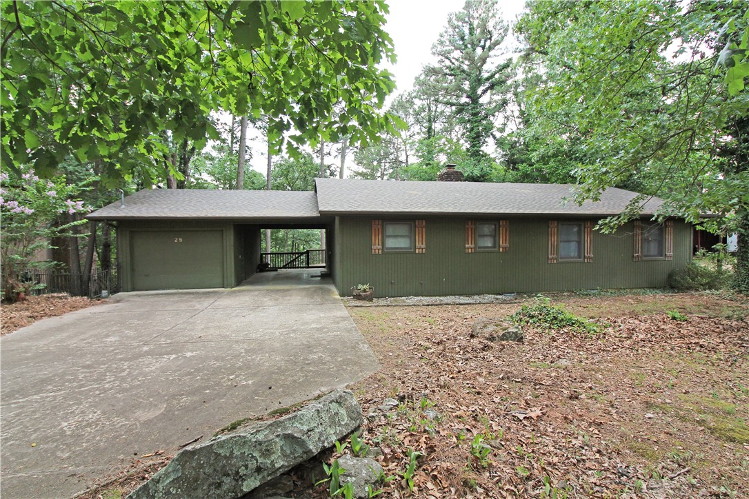Lakehouse property- 3 bedroom, 2 bath, 1 car garage/car port nestled in the woods with beautiful scenery and lake view from the back yard. Dock path way to enjoy the lake- enjoy fishing, biking, amenities- Pool, club house & more with POA. This house features wood floors through out, wood burning fireplace, extra den area/office. French back doors that lead to large deck on back. A must see. Small pet negotiable with increased rent and deposit. Ready Feb 1st or sooner.