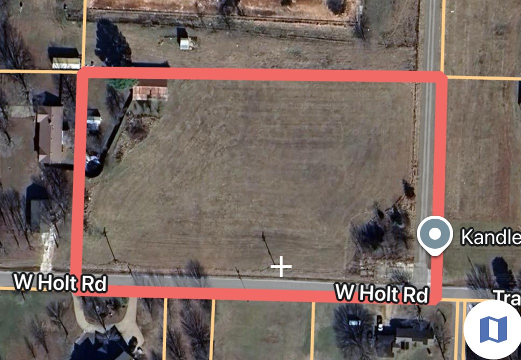 Small acreage close to town, what else could you possibly need on that Christmas list? Flat and buildable, a rare combination these days.  This simple grassy knoll makes it easy to imagine that new house for the lovely wife!  Room for a few animals and a man cave for dad.  Seller willing to look at splitting into 2 tracks, actual size TBD from survey.  Buyer to satisfy themselves with utility hook process and fees.  Also listed as part of MLS#1310337
