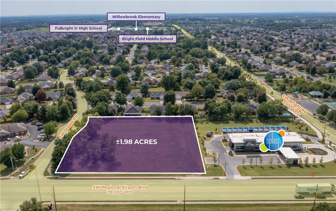 This property offers ±265 linear feet of frontage on SW Regional Airport Boulevard with excellent visibility. The site is flat, cleared, and ready for immediate development, with access shared with Splash Car Wash. All utilities are available on-site, including sewer capacity through connection to NACA (to be confirmed by Buyer). Conveniently located across the street from the Little Osage Creek Trail, the property provides direct connectivity to Creekside Park and Osage Creek Trail. Positioned just 2.7 miles from I-49 and 4.0 miles from the Bentonville Square, this site combines prime visibility with exceptional accessibility.