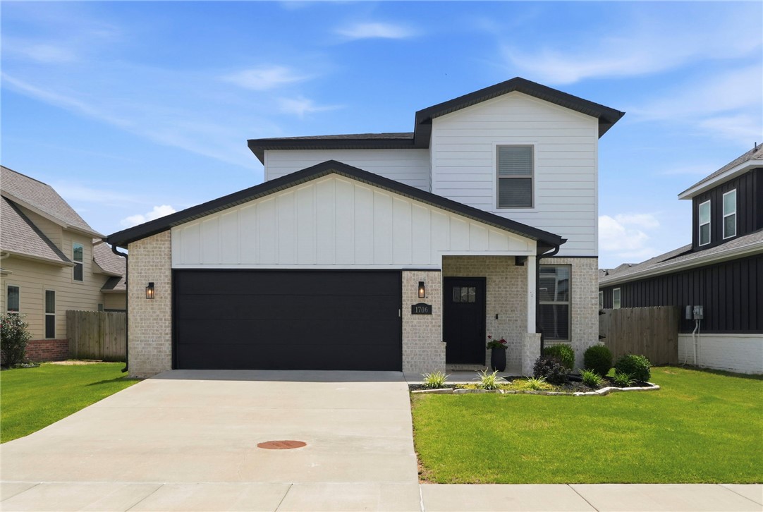 Welcome to The Grove Subdivision! Located just off Pleasant Grove Rd, this move-in ready, 3-bedroom, 2.5-bath home offers unbeatable convenience near new restaurants, shopping, and quick access to I-49. Streets are lined with sidewalks, making this a highly walkable and desirable neighborhood, perfectly situated minutes from Walmart Supercenter, Pinnacle Hills Promenade, Downtown Rogers, the Walmart AMP, Topgolf, and more.

Inside, you’ll find a modern and inviting layout featuring hardwood floors, granite countertops, an open kitchen, and a large living room ideal for everyday living and entertaining. The main floor includes the primary bedroom and bathroom with a soaking tub, laundry room, and half bath. Upstairs offers two generously sized bedrooms and a full bathroom, providing privacy and flexibility for family, guests, or a home office. A large 2-car garage adds extra storage and convenience. Come see all this home has to offer!
