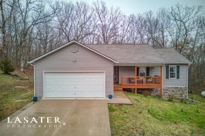 You will not find a more well kept home than this one!  This home is like new and rests on a 1 acre lot at the end of a private lane.  Inside you will find 3 spacious bedrooms, 2 full bathrooms, a large pantry/utility area, updated master bath shower...it's dreamy, plenty of storage space, gas stainless range, gas fireplace, vaulted ceilings and much more! This is the ideal location with its close proximity to Harrison, Hwy 412 and Hwy 65, has a lot of privacy a peaceful setting, an expanded back deck, dry storage under the home, a 2 car garage - this home has it all!