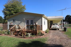 Cute cottage home near East mt. Zion. 2 bedrooms 1 bathroom, large front and back porches for entertaining and enjoying the outdoors. One car carport, fenced backyard, shop, and attached carport. All electric home. Open living, dining, and kitchen. Large trees and quiet secluded location.