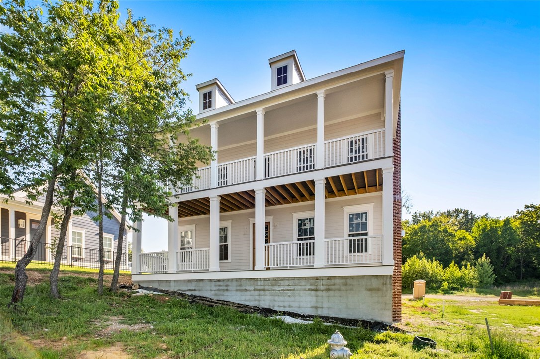 Beautiful new construction with private alley access to garage. Pocket park makes up front yard and allows a beautiful front porch setting.