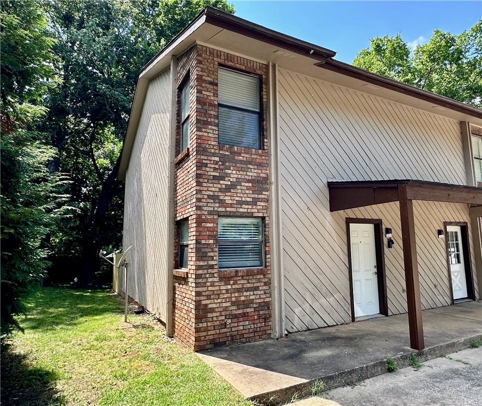 Just minutes from the UofA, this beautifully updated 2-bed, 1.5-bath townhome is an exceptional
opportunity for first-time buyers, students, faculty, or investors! Located only 3.5 miles from campus and
downtown, you'll enjoy quick access to shopping, dining, entertainment, and everything
Fayetteville has to offer. This move-in-ready home has been updated with a newer roof,
HVAC, flooring, paint, granite countertops, refinished cabinets, and lighting & plumbing
fixtures throughout. The kitchen comes newer appliances—including the refrigerator and clothes washer/ dryer. Whether you're looking for a place to call home or a turnkey investment in one of East Fayetteville's most convenient locations, this property checks all the boxes. Schedule your showing today! Listing is for the single townhome unit on the left side. The other 3 adjoining townhome units 2103, 2105, & 2107 N East Oaks are tenant occupied (do not disturb) and also for sale separately, see ML#1354516,1354522,& 1354526, respectively.