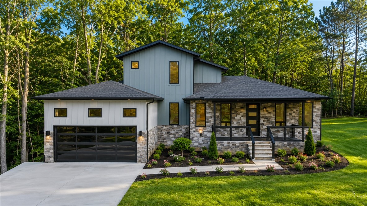 Custom-built home in the highly desirable Bella Vista area, offering 3 bedrooms, 3 full baths, an office, and a versatile bonus room across 2,317 sqft. Designed with quality and attention to detail, this home features high-end finishes throughout, including a modern kitchen with custom cabinetry, premium countertops, and upgraded appliances. The open-concept layout provides a seamless flow between living, dining, and kitchen spaces, perfect for both everyday living and entertaining. The primary suite offers a spa-like bathroom and generous closet space. Additional highlights include a dedicated office for remote work, a bonus room ideal for a media space or gym, and beautifully finished bathrooms. Situated on a large private lot with a peaceful setting, this home combines modern design, functionality, and luxury living.