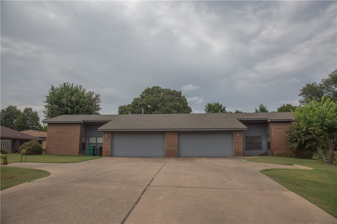 Beautiful duplex in pristine established neighborhood . Hard to find-one of a kind multi family units in the heart of Rogers, mostly all brick exterior, open floor plan with vaulted ceilings, new wood floors, cozy living room with fireplace, spacious bedrooms, spacious laundry room, new roof, gutters, privacy fence, extended driveway, 2 car garage for each unit. Units must be sold together with 1503 and 1505 Olrich.