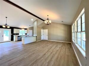 This beautiful ranch style home is 3 bedroom, 2 bath, with 2 car garage. The roomy kitchen features beautiful white cabinets and stainless appliances, with a large dining room perfect for family gatherings. The spacious living room is highlighted by cathedral ceilings and french doors leading to a generous fully fenced back yard. The home is fully renovated, 30x40 shop on slab with sink and water heater, RV hookup for personal use or AirBNB. Located In a safe, walkable neighborhood within walking distance of Arkansas River boat launch and campgrounds at Aux Arc Park. Priced to sell, call for your show today!