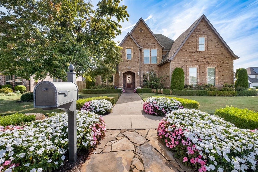 Introducing this Elegant, Stately Home in the Desirable neighborhood of Turnberry at the Peaks.  Attention to Detail Showcased in the Gorgeous Hardwood Flooring, Gourmet Kitchen open to the Family room, Coffered Ceilings in Private Study, & Built-ins throughout, esp. in the Generous Sized Bonus Room Upstairs.  More Entertaining offered in the Private, Beautifully Landscaped Backyard with Stone Fireplace Centered in the Back Patio Area. 4 Split Bedrooms (All Private Ensuites!) Layout offered with 2 Bedroom Ensuites presented downstairs while the other 2 Bedrooms Ensuites located upstairs.  Community pool nearby. Newer roof, carpet, tankless water heater, etc.  Situated in the Heart of Everything- near Pinnacle Promenade Mall, Walmart Amp, Top Golf and 1-49 to name a few. Welcome Home!