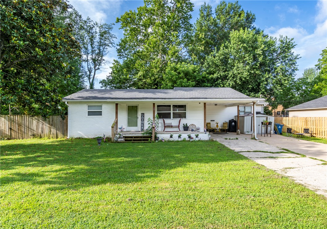 Nice 3 bed 2 bath home, hardwood floors with above ground pool and Hot tub , 2 storage buildings, walking distance to schools grades kindergarten thru 8th grade and business district. There is a second living room could be used as a 4th bedroom as well. The enclosed patio is not included in the square footage. Also a large fenced in back yard.