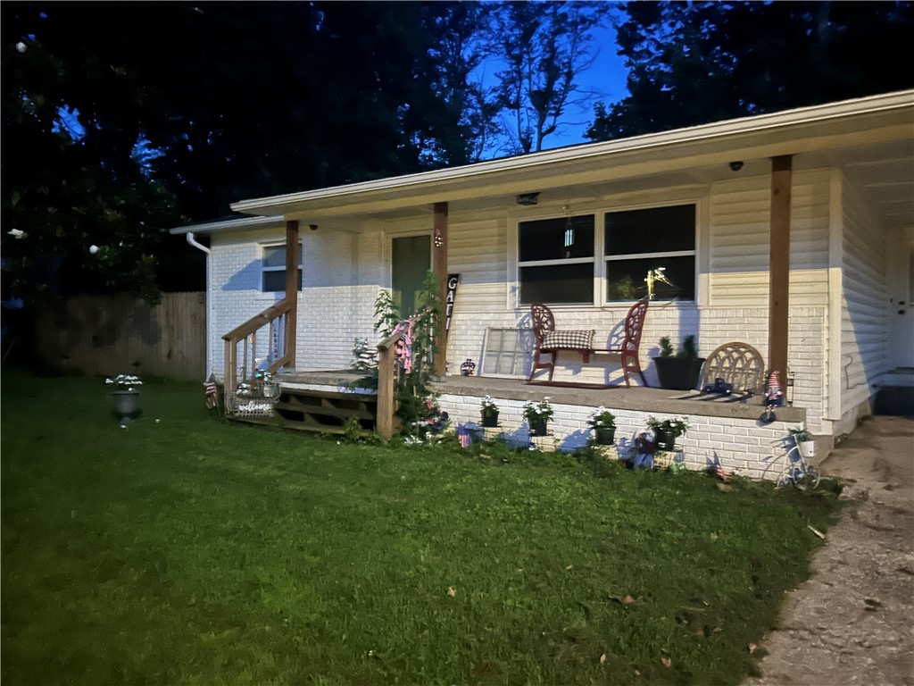 Nice 3 bed 2 bath home, hardwood floors with above ground pool and Hot tub , 2 storage buildings, walking distance to schools grades kindergarten thru 8th grade and business district. There is a second living room could be used as a 4th bedroom as well. The enclosed patio is not included in the square footage. Also a large fenced in back yard. Above ground pool, (will need a new liner) soon.