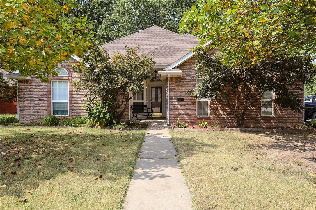 Location-Value-Happiness! All at corner of cul-du-sac. Very well maintained, 1 yr old appliances, refinished wood floors. New carpet, paint, tile, roof all in 2017. Peaceful neighborhood, side load garage, lg covered patio, outdoor shed. Only 6 minutes to historic downtown Bentonville square, the park, the food trucks, family activities, local restaurants, unique shopping, trails for hiking, biking & much more. 21-C hotel/museum. Crystal Bridges & the Amazeum only 10 minutes. Wal-Mart home office 6 min