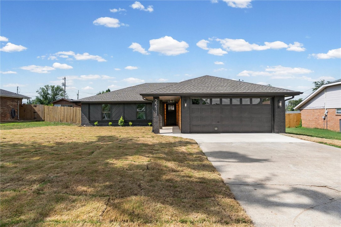 Stop the scroll! This stunning, fully renovated home is the one you've been waiting for! Welcome to 2211 W Olrich, where every detail has been thoughtfully updated inside & out. The spacious living room features cathedral ceilings with a beautiful wooden beam & a cozy fireplace, creating the perfect space to relax or entertain. The eat-in kitchen shines with quartz countertops, a beautiful backsplash, & an island. The spacious primary suite offers a walk-in closet, dual vanities, & a floor-to-ceiling custom tiled shower. The second bath is equally impressive with dual vanities & its own custom tile bathtub. Enjoy the covered front porch, fresh landscaping, new sod, & the peace of mind of a newer roof. Conveniently located less than 5 minutes from Rogers High School, Walmart, & the Rogers Aquatic Center, & only 10 minutes from Pinnacle Hills Promenade & the Walmart AMP. Move-in ready with stylish updates & an unbeatable location!
