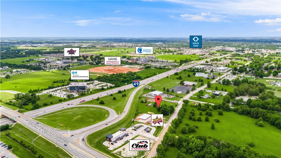 Exceptional development opportunity! This prime 2.79 acre lot is positioned between I-49 and S 48th St at the Don Tyson Pkwy exit. Located in the heart of the Springdale Care Corridor, and surrounded by various new retail, office, medical, and mixed-use developments. Anchored by Lamar Advertising, Club Carwash, & Jake's Fireworks - Level lot with all utilities on site - Near Walmart Neighborhood Market and Casey's General Store - High traffic visibility with 103,000 cars per day along I-49
In close proximity to Children's Northwest Hospital, Blue Cross & Blue Shield, Highland Oncology, UAMS, & Arvest Ballpark.