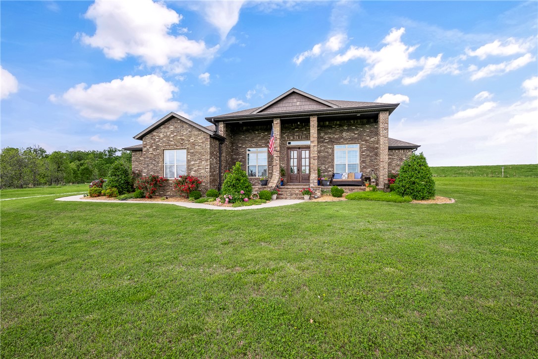 Welcome to 244 NE Pianalto ST, Bentonville, Arkansas, a luxury single-family residence built in 2017 that exemplifies sophisticated living. This home, in great condition, features an amazing design crafted with top-tier materials, offering an unparalleled living experience across its 2681 square feet. The heart of this home is its kitchen, a culinary dream designed for both efficiency and entertaining. It boasts a G-shaped layout complemented by an island and a peninsula, all adorned with elegant stone counters. Equipped with stainless steel appliances, including a built-in microwave and a custom range hood, this space seamlessly flows into the living room, fostering an open and inviting atmosphere. Adjacent to this vibrant kitchen, the living room provides a comfortable retreat, centered around a charming fireplace, perfect for gathering and relaxation. Comfort and privacy define the sleeping quarters. All bedrooms have walk-in closets. Bookcase and Blink surveillance equipment do not convey.