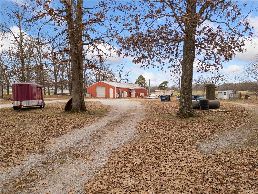 ATTENTION ANY AND ALL ENTREPRENEURS……. Established in 1994, this 31 Year old business is now for sale.  Rowe Woodworking has decided to hand over the reins to their well-established cabinet, cabinet door and wood furniture manufacturing business.  The business sits on 2.4 ac m/l and has not only State Highway 7 frontage but also frontage along Southwest St.   The main shop is a well insulated 1500 sq feet and is full of high-end wood working equipment, that would convey.  The purchase would also include several outbuildings, a carport and other equipment currently being used for storage.  The back portion that runs along Southwest St could be sold separately for potential building lots or build your house and walk to work.  Come check out this turnkey business, opportunities like this don’t come around very often!!