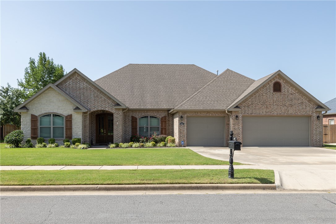 Stunning one-level home offering easy access to the highway and a thoughtfully designed floor plan. Featuring 4 bedrooms, 2.5 bathrooms, and a spacious 3-car garage. The 4th bedroom can easily serve as an office! The open-concept living area is highlighted by beautiful wood beams and abundant natural light. The large kitchen showcases quartz countertops, a gas cooktop, ample cabinetry, and generous prep space. The private primary suite features a spa-like bath with a tiled shower and an oversized walk-in closet that connects directly to the laundry room for added convenience. Enjoy outdoor living year-round on the covered back patio complete with a cozy fireplace. Additional upgrades can be found throughout this exceptionally well-maintained, move-in ready home.