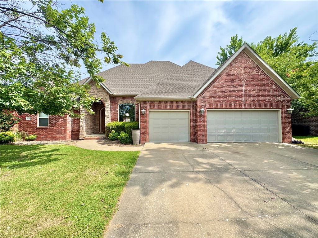 Introducing 4506 Flagstick. 5 bedrooms and 3 full baths across 2,638 square feet in West Fayetteville. The split floor plan sets the primary suite apart, with a trey ceiling, corner garden tub, separate shower, double vanity and walk-in closet. A built-in wall oven, smooth cooktop and vent hood to anchor the kitchen, which also features brand new countertops, new kitchen cabinets, and new paint throughout. From here, the kitchen opens up to the hearth room with a gas-log fireplace, separate formal dining and living rooms, plus a dedicated utility room. Brick and stone exterior, covered rear patio and a privacy- fenced back yard. Three-car attached garage with wide concrete drive. Level, landscaped lot with sidewalks in an established Fayetteville neighborhood, minutes from Wedington and I-49.