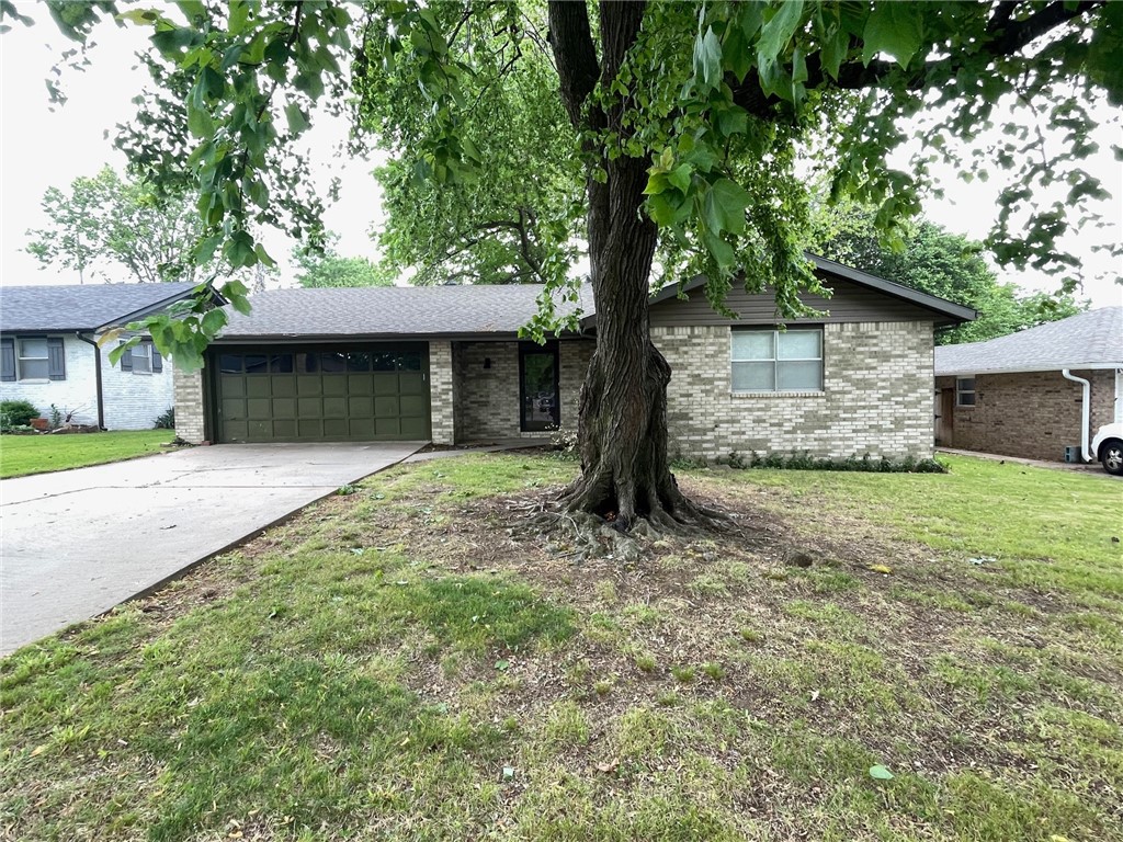 This freshly updated 1,632 sq ft home features 3 bedrooms, 2 bathrooms, and a 2-car garage. This property offers a clean, modern space ideal for comfortable living. Recent renovations include new wood and ceramic tile flooring throughout, fully remodeled bathrooms, updated light fixtures, fresh paint on walls, cabinets, and trim, and an enclosed patio perfect for relaxing or entertaining. Blinds are installed throughout for added privacy and style. Enjoy a spacious backyard with mature trees and a wood privacy fence, providing a peaceful outdoor setting. Located just minutes from the Tyson Sports Complex, schools, and shopping, this home offers convenience and accessibility in a quiet neighborhood. No pets allowed. Tenant responsible for utilities and lawn care. Security deposit and background check required.