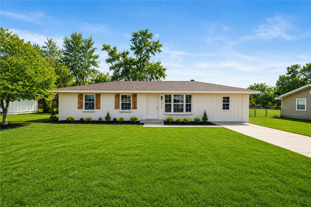 Fully renovated and move-in ready! Welcome to 2000 W Wood St in Rogers, AR, offering 4 bedrooms, 1.5 baths, and approximately 1,250 sq ft of beautifully updated living space. This home features a brand-new roof, new AC unit, new water heater, and new electrical panel—providing peace of mind for years to come. Inside, you’ll find new flooring throughout, fresh interior paint, and a completely remodeled kitchen with stunning quartz countertops and modern finishes. The exterior has also been freshly painted, enhancing the home’s curb appeal. Step outside to a huge backyard with plenty of space for entertaining, pets, or future possibilities. Conveniently located near schools, shopping, dining, and major roads, this home offers the perfect blend of comfort, style, and location. Don’t miss this turnkey opportunity!