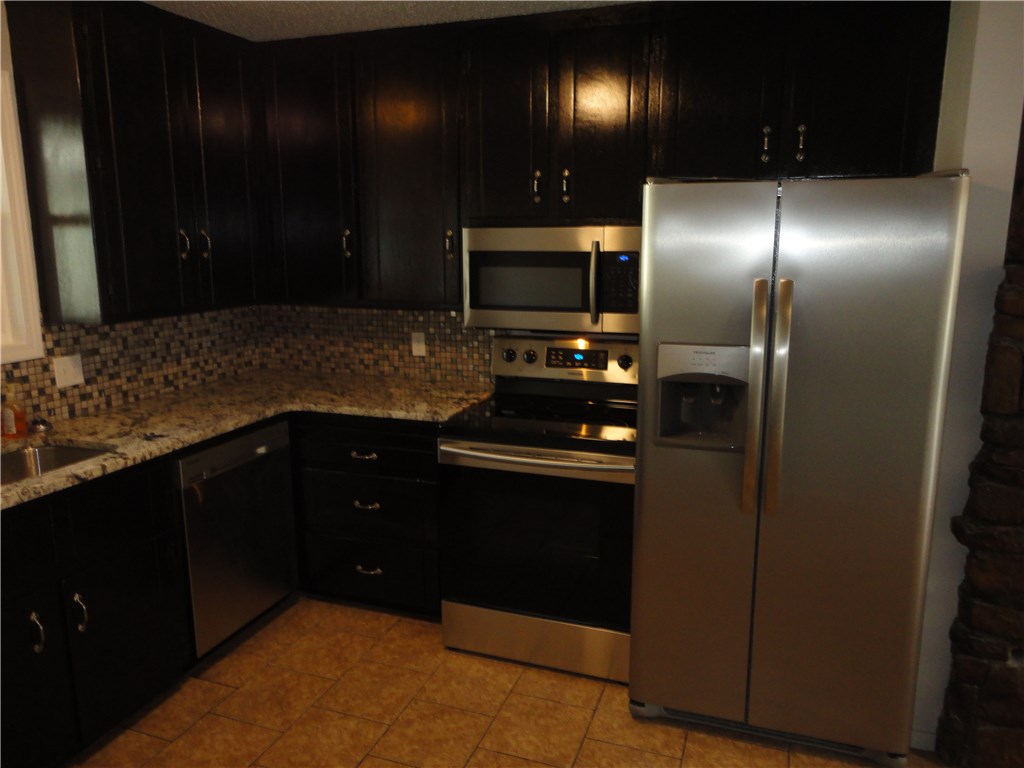 Money Maker! Completely remodeled Duplex In Prairie creek, Will rent for $850-$900 monthly or you can do weekly or nightly rentals since it is right by Beaver Lake. New Roof, Windows, int/ext paint, New SS appliances and granite countertops, Carpet, and renovated the master bathrooms to include a washer and dryer area. Water is on one meter and duplex is on a septic system. Tenants pay gas and electric. Live in one side and let your tenant make most of your payment. Agent Owned. Call agent to show.