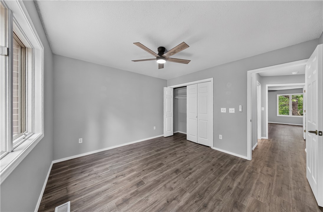 Come see this gorgeous home that has fresh paint, newer stove and microwave, new hardware and lights all with sitting right beside the Tunnel Vision trail.  The gorgeous sunroom off the back features a beautiful view of the woods and trail.  There is a golf cart negotiable as well with a brand new battery.  Plenty of storage underneath as well.