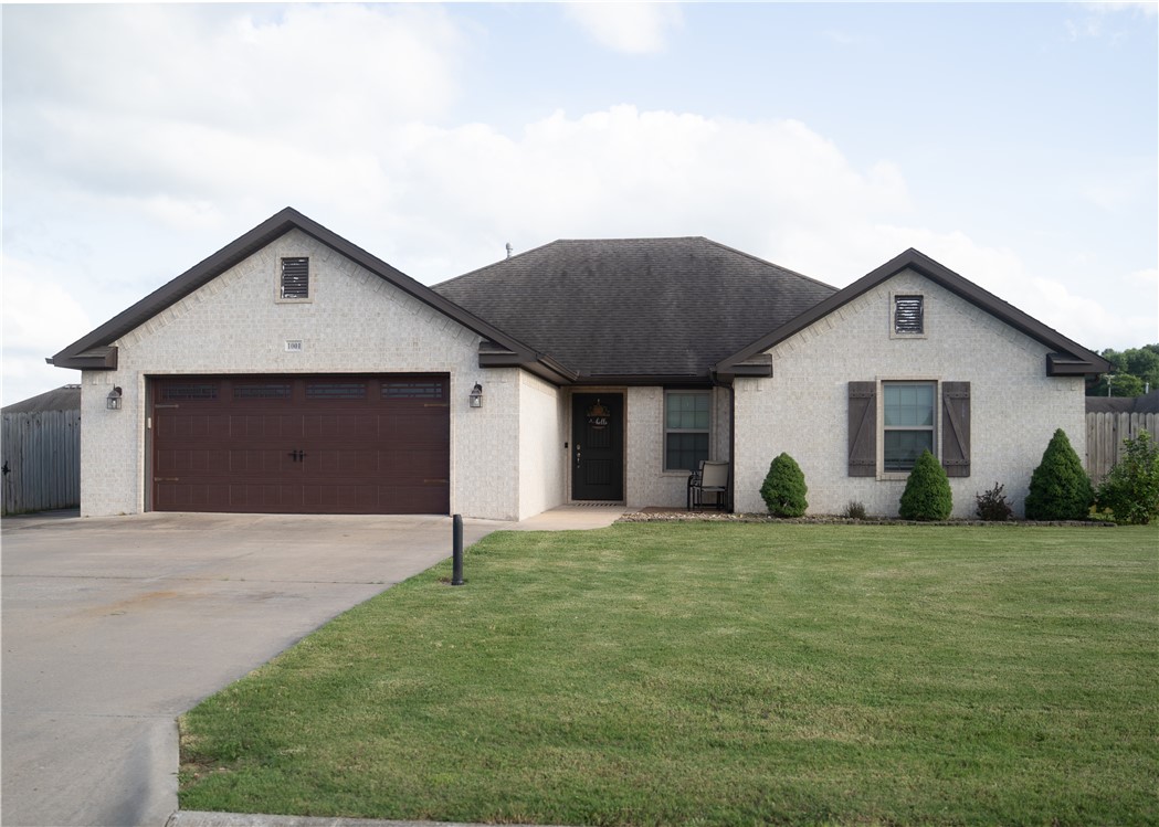 Comfort and convenience come together in this charming 4-bedroom, 2-bath home in Elkins, built in 2017. Situated on a .45-acre corner lot, it features a wood privacy-fenced backyard, 144 sq. ft. storage shed, and Pergola-covered patio—ideal for entertaining. The insulated 2-car garage includes a floored attic plus driveway extension with backyard gate access. Inside, enjoy a welcoming family room with custom built-ins and a custom brick gas-log fireplace. Wood-look ceramic tile flows through the living and kitchen areas. The kitchen offers an island, stylish cabinetry, 5-burner gas stove, stainless farmhouse sink, and dining area with access to a covered patio wired for a hot tub and connected to the Pergola patio. The spacious primary suite includes separate his-and-her walk-in closets, a Jacuzzi tub, and double-headed walk-in shower. Don’t miss this one—schedule your showing today!