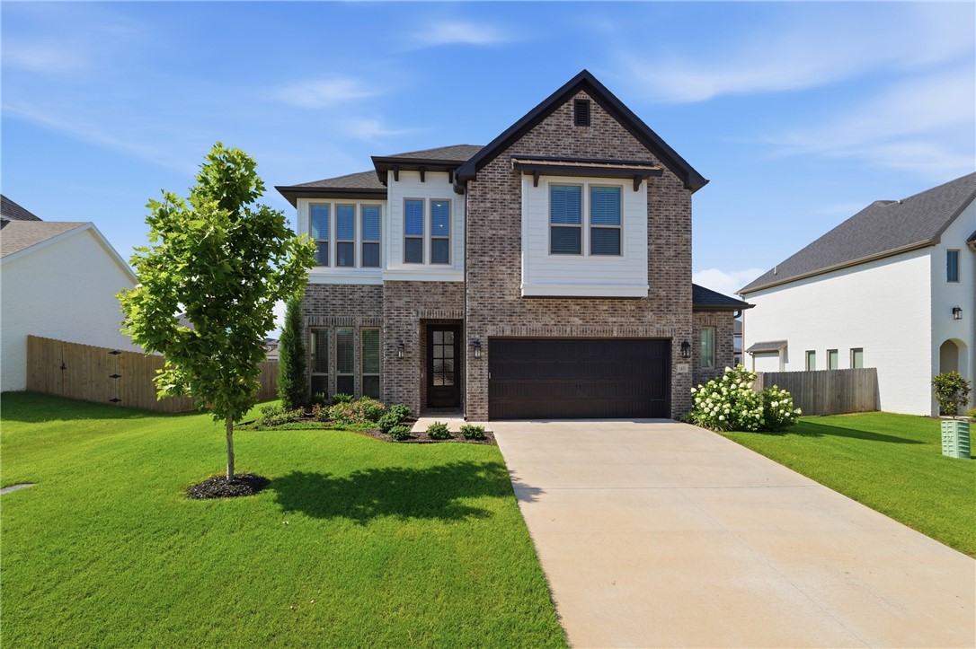 Welcome to this beautifully appointed Gramercy floor plan in the desirable Allen's Mill community. This 3-bedroom + office home offers an open-concept layout filled with natural light from expansive windows. The main level features wood flooring, soaring ceilings, elegant 8-foot doors, and premium finishes throughout. The gourmet kitchen flows seamlessly into the living and dining areas, perfect for everyday living and entertaining. The spacious primary suite includes a bay window sitting area, spa-inspired bath with a soaking tub, walk-in tiled shower, and oversized walk-in closet. Upstairs, the versatile game room is ideal as a media room, office, gym, playroom, or 4th bedroom. Relax year-round on the covered patio with a cozy gas fireplace outside. The garage offers additional storage. Conveniently located near Bentonville schools and Mt. Hebron Park with access to neighborhood amenities, including a community pool and park.