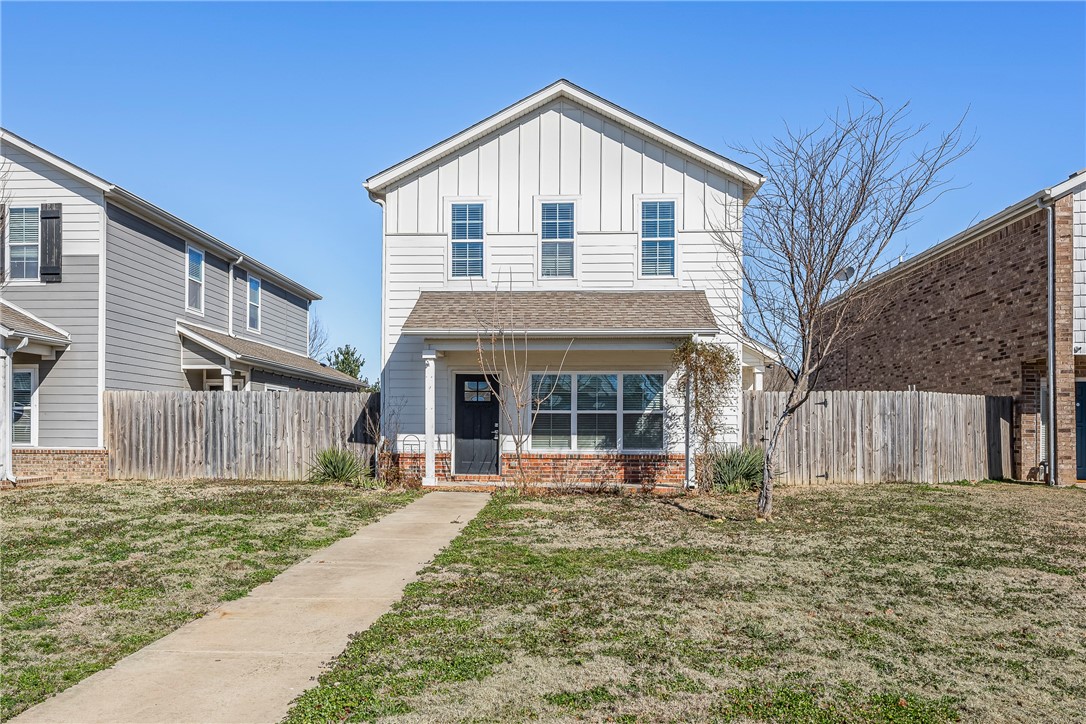 A beautiful Craftsman Style row house located across from one of the best Elementary schools in Rogers. Tucker Elementary. As you walk in the WOW factor with the tall ceilings and the open format. Stunning granite on all countertops, and Island. This has a Eat in dining area in the kitchen and a spacious pantry.
This stunning home has a privacy wood fence with gate, 2" blinds, walk in closets, stainless appliances. Washer,  Dryer, and Side by Side Stainless refrigerator convey with home. It is close to Restaurants, shopping and Schools