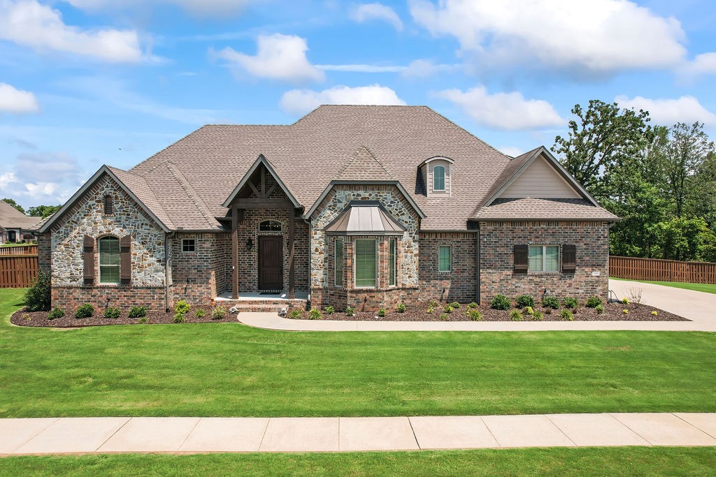 Don’t miss out on this rare find! New roof installed August ‘24. Custom built home in the Angel Falls with direct neighborhood access to Coler Mountain Bike Preserve. Only 3 miles from downtown Bentonville and the Walmart Home Office. Home is on a .81 acre flat, corner lot that feels like a double lot given its size. From the main living area, look out at your backyard oasis complete with an in ground saltwater pool and large covered patio with built in grill and outdoor fireplace. This home checks all the boxes: coveted location, spacious/flat lot, pool, basketball goal, in ground storm shelter, oversized garage with heated and cooled workshop, ample storage including walk in attic, and a massive bonus room that currently serves as a theater room but could be 5th bedroom. Home has been immaculately maintained. In addition to new roof, has new pool liner, new appliances, upgraded fans and light fixtures throughout. This one has it all!