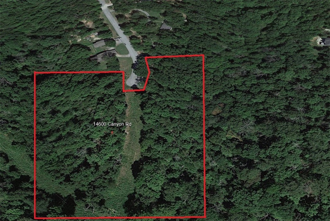 Looking for a quiet, beautiful place to build? This rare 5.27-acre parcel in Bella Vista offers both space and flexibility. Nestled at the end of a lovely, lightly developed street, it provides privacy while still being convenient to town. Unlike most Bella Vista properties, this lot is not in the Bella Vista POA—giving you the freedom to add a barn, shop, or other structures. The property has already been perc tested and has Centerton city water running through the lots. With multiple potential building sites, you can create the home and lifestyle you’ve always wanted. Don’t need all 5.27 acres? The property spans two lots, making it easy to build on one and sell the other—or simply pick your own neighbor. The owner has marked many of the dogwood trees with ribbon, and an approximate lot line is marked by the road for easy viewing. Contact your builder, agent, or call today to schedule a private showing. Perc test locations were on Right & left side of property about 100' off the road.