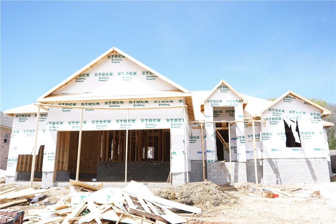 Beautiful all brick home with many features. This plan has a 3 car garage, 9' ceilings throughout with 10' in master bedroom and living room. Master bath boast custom tiled shower with kitchen height vanity, Make this house your home.