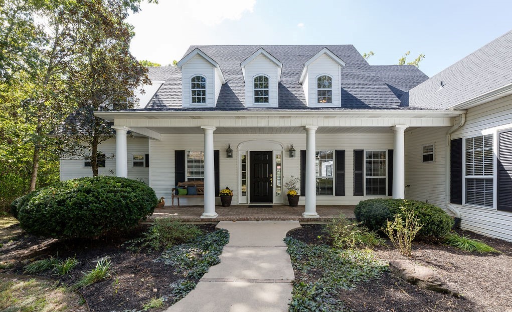 Experience this beautiful custom built home minutes from Fayetteville! This architecturally classic home is nestled in a quiet cul de sac w/3.7 acres of serene forest to ensure you are at one w/nature. See the trees explode in beauty every Spring & relax on the back deck w/a babbling wet weather creek in the Spring & Fall. Home features an open, airy great room full of light from the expansive windows, looking out into the woods. The second level also features an open loft w/an incredible forest view. Enjoy the convenience of a main level master suite w/adjoining den. House features expansive storage space, incl. a large bonus area over the 3rd car garage. Another bonus room can be found over the main garage, perfect as a family room or home theater. Home features a new roof w/a 5 year warranty that transfers to the new owner! Fresh landscaping adorns the surrounding yard for a home as beautiful outside as it is inside. Do not miss this rare opportunity to possess this private & unique one owner home!