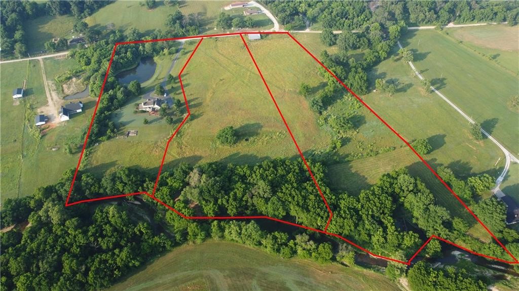 Rare land available in Tontitown that has Brush Creek running through the back of it. No mobile homes allowed and no recreational or commercial marijuana farming or sales. Buyer allowed to have a maximum of 2 single family homesteads - location must be approved by seller. Sites can only be used for residential use except for agriculture farming of food products. Seller retains the rights to approve architecture of any construction on the property. Refer to MLS# 1269139