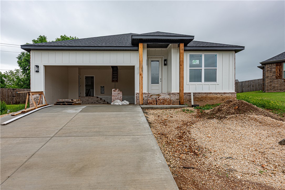 This NEW CONSTRUCTION 3 bedroom 2 bathroom home in the Mountain View Estates is just min from downtown Prairie Grove & under 10 mi to I-49 & Fayetteville! From the covered front porch head inside to a spacious open concept. Plans feature 9’ ceilings, fireplace, LVP floors throughout, dining area, w/ kitchen feat pantry & center island. Relax in the primary suite feat: Dual sink vanity, private toilet, walk-in shower, & walk-in closet! Split floor plan with 2 add’l BRs and full BA. Spacious laundry room with built-ins. Enjoy the comfort of a covered back patio! Don't Miss out, Act Now!