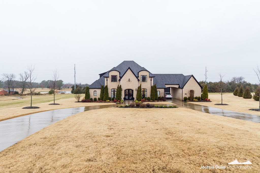 Fantastic East Fayetteville Bridgewater Estates Home situated on 2.01 acres!  4,534 heated sq ft features 5 bedrooms, 3 full and 1 half baths, study, formal dining, oversized kitchen open to living, separate laundry and mud room, and bonus room.  Other amenities include 2 bedrooms on the main level, hardwood floors, commercial grade appliances, Jeldwen casement windows, 2 fireplaces, wet bar, private backyard, and more. Grand entrance as well as a portico for a stunning curb appeal.  Vandergriff Schools.