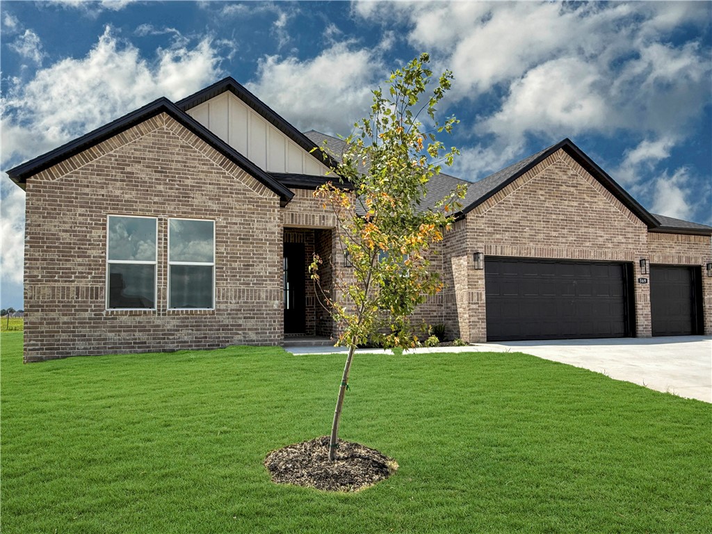 The Frisco plan in Renley Rae in Springdale, AR! This plan offers 4 bedrooms and 3 bathrooms! Single-story homes feature engineered wood flooring throughout and tile flooring in the primary bathroom. The kitchen features quartz countertops, 42’’ cabinets, black hardware, and a gas range. The living room features a beautiful modern fireplace with a poplar mantle! Fans are included in all bedrooms and the living room! The primary ensuite will have a walk-in shower, separate tub, and quartz countertops! The exterior of these homes will have 4-sides brick with Hardie® siding (per plan) with a 3-car garage! Each home will have a lovely covered back patio. Taxes, HOA, and parcel TBD. Home is located in Tontitown/Springdale.