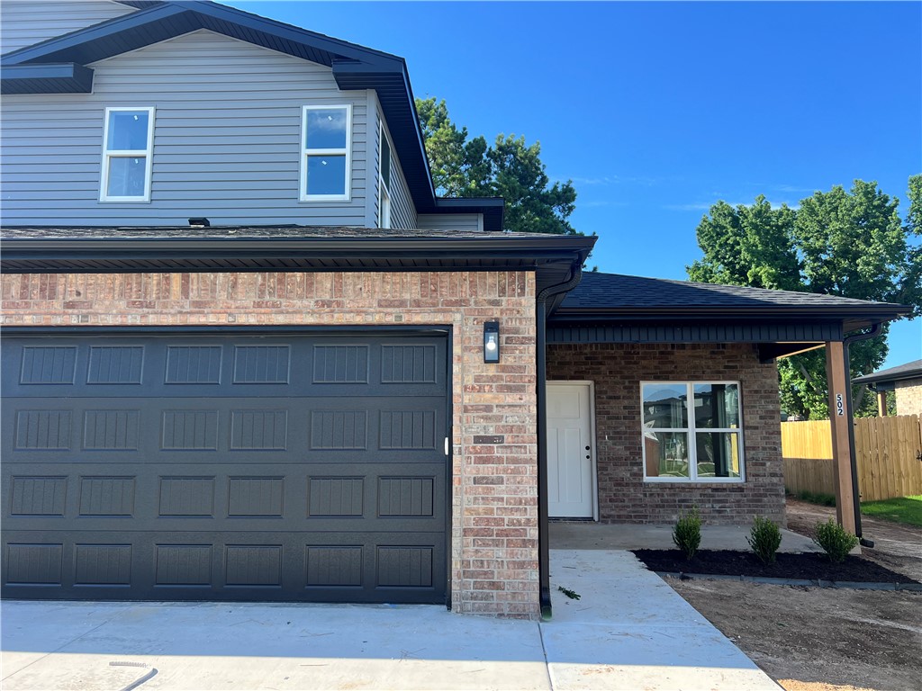New Construction! Town home style Duplex offering 3 bedrooms and 2.5 baths in a great Centerton location. The main level features LVP flooring with upgraded carpet on stairs and second floor. Kitchen comes equipped with a refrigerator, and the home also includes a washer and dryer for added convenience. Enjoy an attached 2-car garage, a private patio, and a fenced backyard. EV plug in Garage. Located close to area schools, the Walmart Distribution Center, and with quick access to all Centerton and Bentonville amenities. Tenants are responsible for all utilities and lawn care. *photos are of similar model