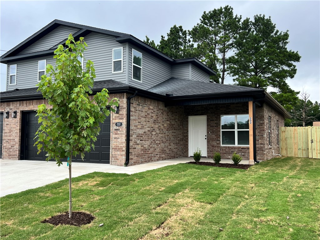 New Construction! Town home style Duplex offering 3 bedrooms and 2.5 baths in a great Centerton location. The main level features LVP flooring with upgraded carpet on stairs and second floor. Kitchen comes equipped with a refrigerator, and the home also includes a washer and dryer for added convenience. Enjoy an attached 2-car garage, a private patio, and a fenced backyard. Located close to area schools, the Walmart Distribution Center, and with quick access to all Centerton and Bentonville amenities. Tenants are responsible for all utilities and lawn care.