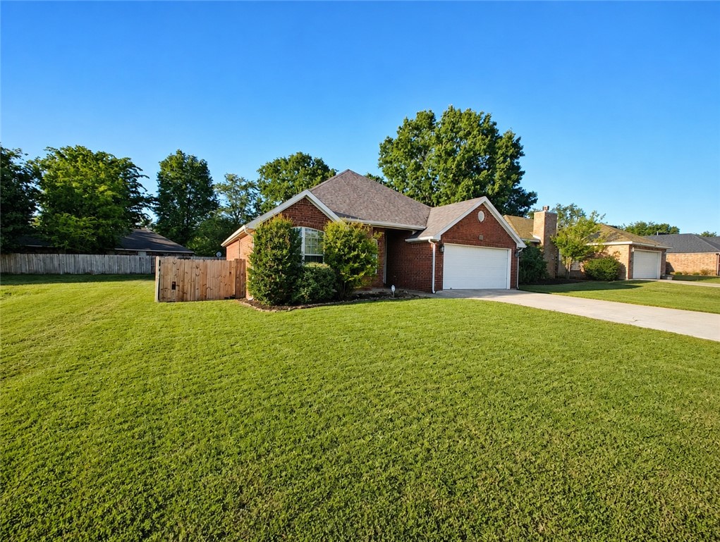 Well maintained home in an established neighborhood offering privacy with no neighbor on one side. Recent updates include a new roof, fresh interior paint, updated light fixtures, and a 2023 dishwasher and garbage disposal. The fenced yard has been mostly updated and provides a great outdoor space for relaxing and entertaining. Conveniently located close to Walmart Neighborhood Market, Harps, and a wide selection of restaurants. A solid, move-in ready home in a great location.