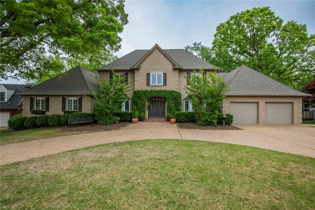 Located in one of Bentonville’s most sought after neighborhoods, this 3,863 SF home offers timeless character and endless potential. The thoughtful layout includes a main level primary suite with private screened porch, spacious kitchen with breakfast nook, formal dining, two living areas, and a private office. Two additional bedrooms and bathrooms upstairs, with a bonus room that could easily be converted to a 4th bedroom. Enjoy a large deck overlooking the private backyard, a 3-car tandem garage great for bike storage and circle drive for additional parking. Less than 2 miles from Coler Mountain and Downtown Bentonville. A rare opportunity to personalize a well-built home in a premier Bentonville location. Schedule your showing today!