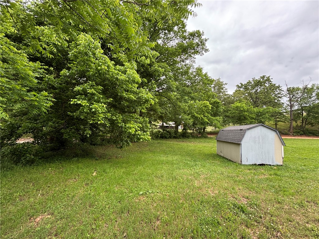 Great 2.5 acre homesite. About 30% open with the balance wooded. Electric at street and rural water meter available. The property fronts Wade Rd and Eubanks Dr. and features a great location between Harrison and Bull Shoals Lake! It's within an hour or less of Branson, MO, Table Rock and Bull Shoals Lakes, the White, Buffalo, and Kings Rivers, Crooked Creek, Clear Creek, and numerous hiking, camping, swimming, canoeing, fishing, hunting and sightseeing venues. Buyer to confirm availability of utilities. Tax amount is an estimate. DEED RESTRICTIONS of: No mobile homes more than 5 years old at time of placement. No commercial hog or poultry operations. No salvage or junk yards. The sale of this property cannot close until the sale and close of 5682 Wade Road (MLS #1332915).