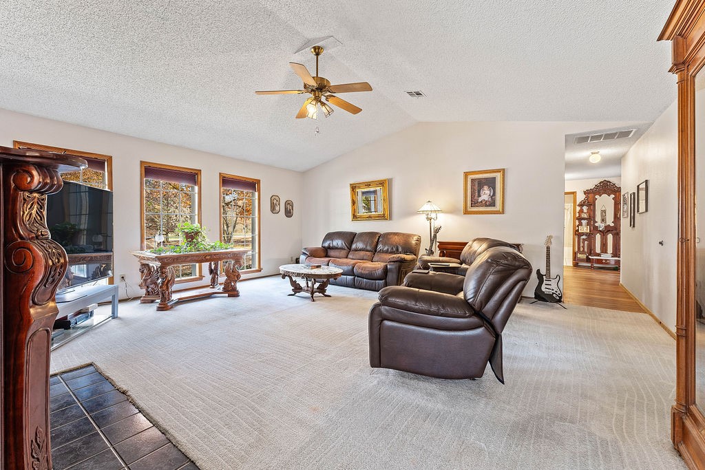Welcome to 21660 Seminole Ct, where comfort, charm, & space come together on nearly half an acre in a beautiful, park-like neighborhood. 

Step inside & feel at home as natural light fills the living space. Off the entry, the bright formal dining room opens into a well-appointed kitchen with plenty of prep space, storage, & an inviting attached breakfast room. From here, slip into the sunroom; updated with new Pella windows—perfect for morning coffee! 

The spacious living area is ideal for entertaining, complete with a warm, cozy fireplace for crisp winter nights. The private primary suite offers dual closets & a roomy en-suite with double vanities. Two additional guest bedrooms provide comfort and great closet space, & the home is filled with thoughtful built-ins, storage throughout & a welcoming flow. 

Outside, enjoy a fenced yard ready for play, gardening, or pets, along with a convenient 2-car garage. Located just moments to JBU, parks, creeks, City Lake, & all Siloam Springs has to offer.