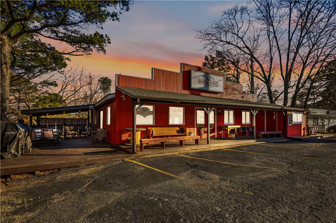 This property offers the" Best of Both Worlds".   High traffic business location and full living quarters.  Currently a General Store with a small lunch area.  This location is suited for any type of business and 3 bedroom living quarters could become a nightly or month to month rental.  Seller will consider selling current business and inventory separately.  This is a year round business so appointments have to be made for all showings.